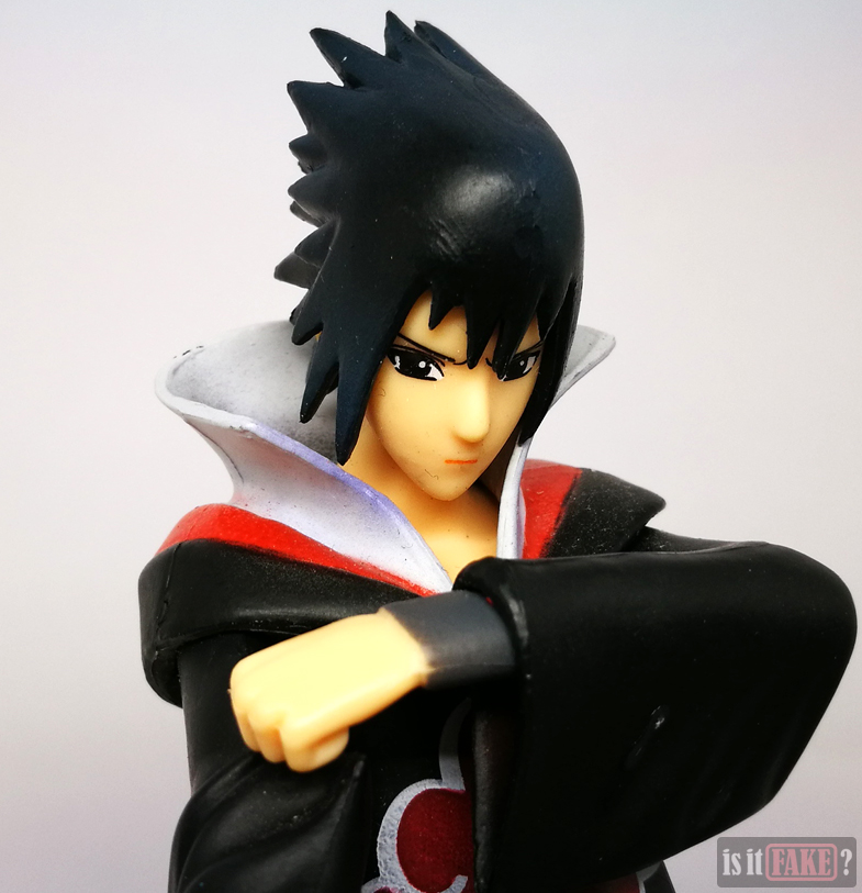 Fake Sasuke Uchiha figure, close-up on face