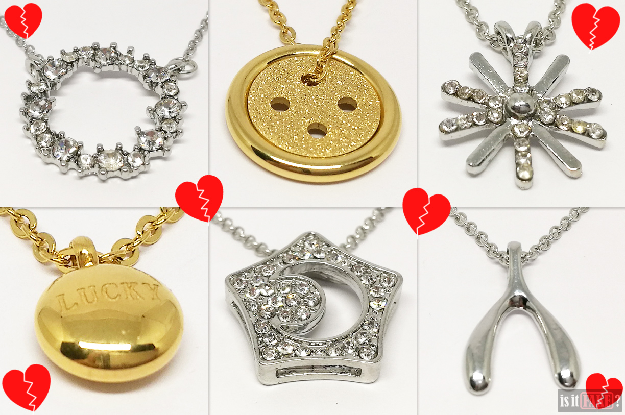 Close-up of pendants of fake Boys Over Flowers, Descendants of the Sun, Doctors, The Heirs, Legend of the Blue Sea, and Pinocchio necklaces