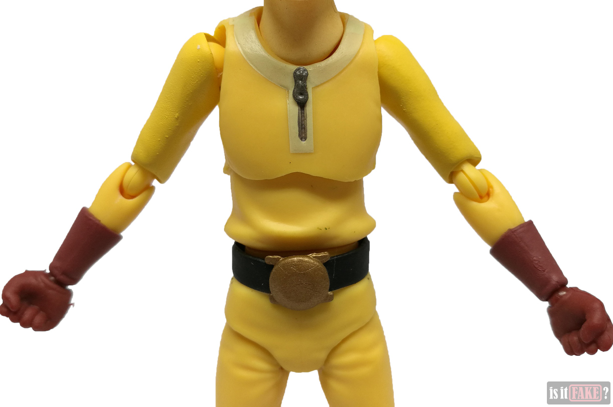 Close-up of fake Figma One Punch Man figure's torso and arms, front view