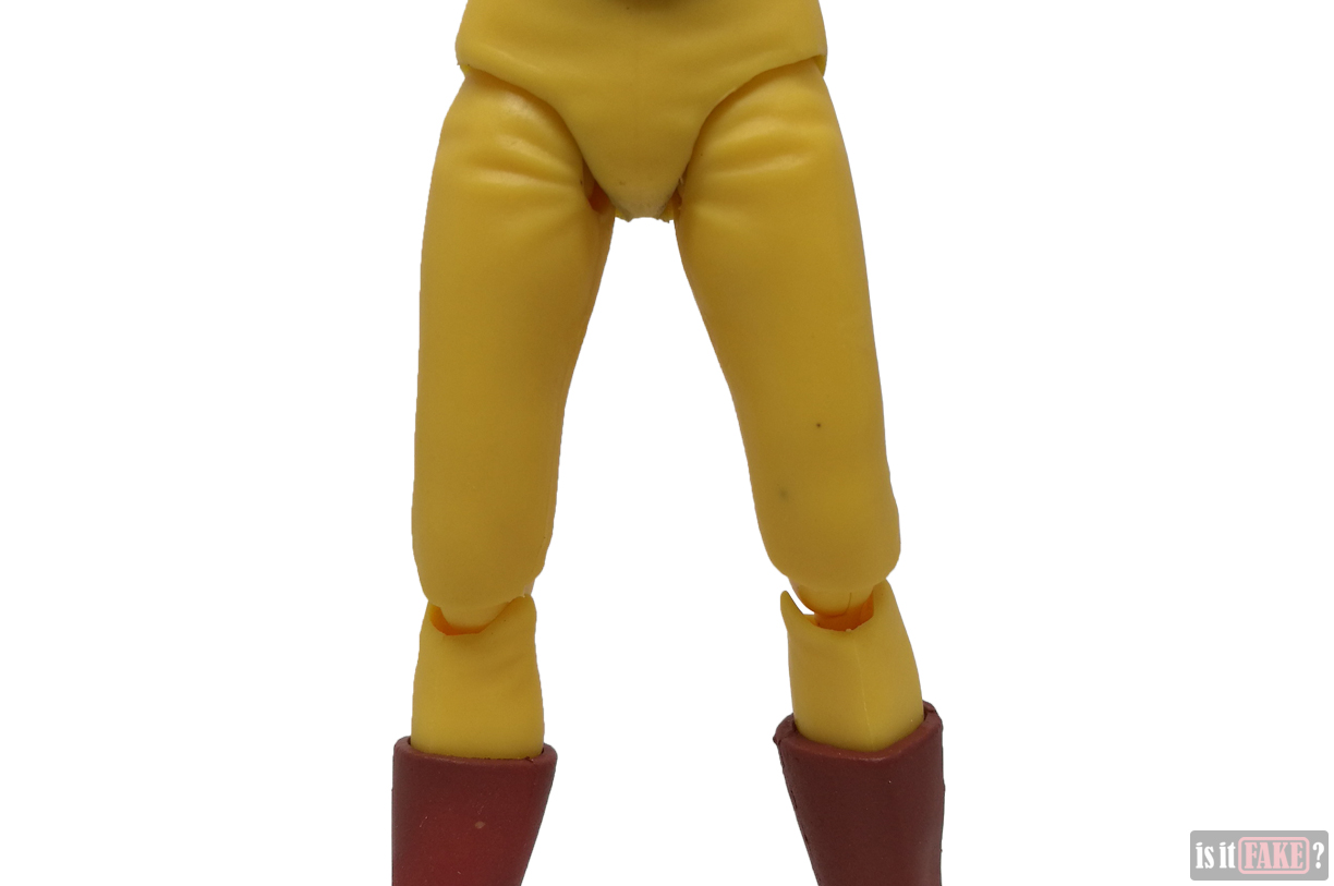 Close-up of fake Figma One Punch Man figure's groin and legs