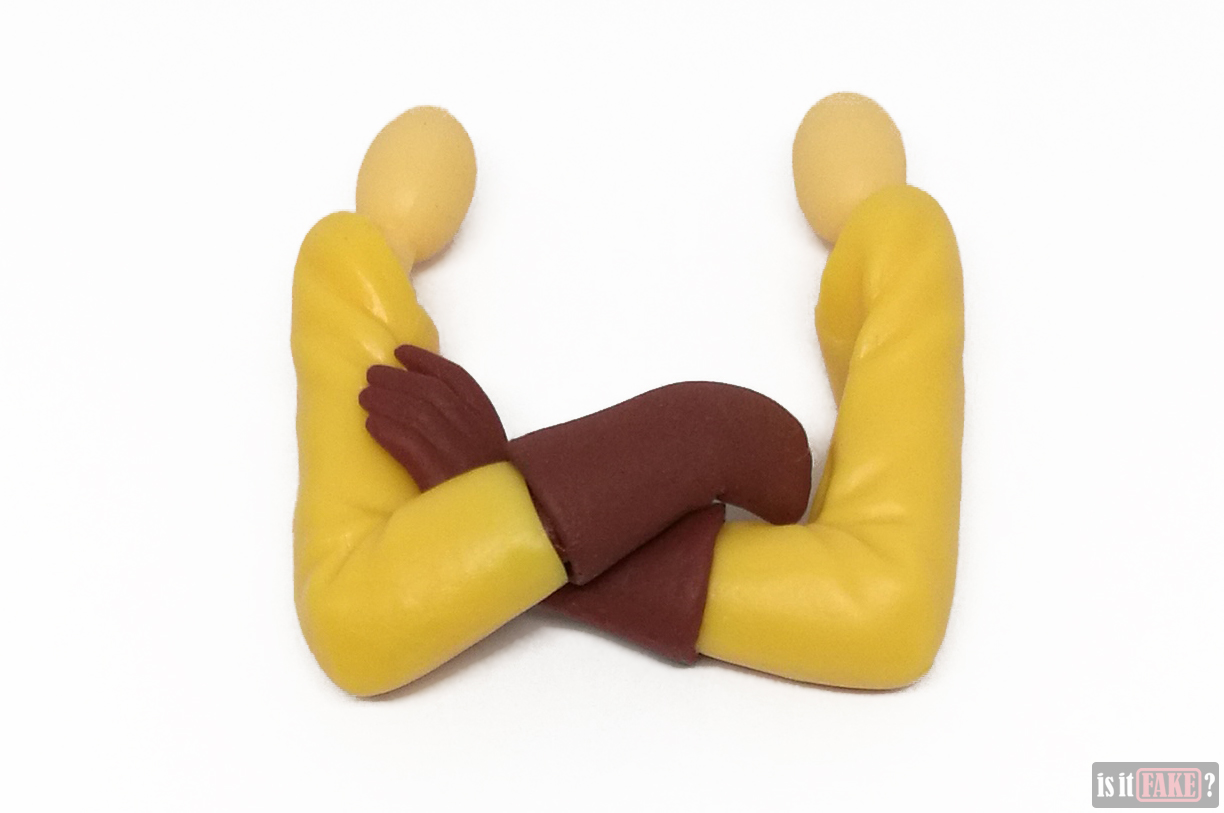 Fake Figma One Punch Man figure's crossed arms accessories